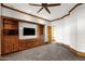 Bonus room featuring custom built-ins, wood trim, and recessed lighting at 14760 E Paradise Dr, Fountain Hills, AZ 85268