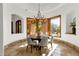 Charming dining area featuring abundant natural light and views of the exterior desert landscape at 14760 E Paradise Dr, Fountain Hills, AZ 85268