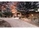 Stunning single-story home featuring a circular driveway and desert landscaping at 14760 E Paradise Dr, Fountain Hills, AZ 85268