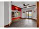 Spacious home gym featuring padded floors, mirrored wall, and french doors to the backyard at 14760 E Paradise Dr, Fountain Hills, AZ 85268