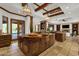 Gourmet kitchen features a spacious island with a sink and stone tile floors throughout at 14760 E Paradise Dr, Fountain Hills, AZ 85268