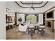 Open living space with high ceilings, stone fireplace, and seamless indoor-outdoor living at 14760 E Paradise Dr, Fountain Hills, AZ 85268