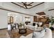 A grand living area seamlessly integrates comfort with stylish design and an open floor plan at 14760 E Paradise Dr, Fountain Hills, AZ 85268