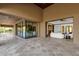 Covered patio seamlessly connects indoor and outdoor living spaces with glass windows at 14760 E Paradise Dr, Fountain Hills, AZ 85268