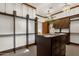Walk-in closet with custom cabinets, decorative lighting, and lots of storage space at 14760 E Paradise Dr, Fountain Hills, AZ 85268