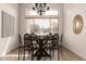 Bright dining room featuring elegant furnishings and plenty of natural light at 16222 W Augusta Ave, Litchfield Park, AZ 85340