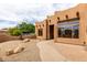 Beautiful house with a curved pathway and unique rock landscaping at 16222 W Augusta Ave, Litchfield Park, AZ 85340