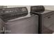Close up of a dark washer and dryer set at 16222 W Augusta Ave, Litchfield Park, AZ 85340