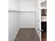 Walk-in closet providing storage and easy access, leading to the bathroom at 16418 W Whitehorn Way, Surprise, AZ 85387