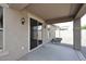 A view of the covered patio showing the backyard at 16418 W Whitehorn Way, Surprise, AZ 85387