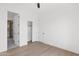 Bright bedroom with wood floors, closet and modern features with plenty of space at 19550 N Grayhawk Dr # 1039, Scottsdale, AZ 85255