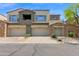 Multi-Gathering residential building with stone accents, private balconies and garages, situated on a well-maintained street at 19550 N Grayhawk Dr # 1039, Scottsdale, AZ 85255