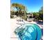 Relaxing hot tub with nearby table seating and desert landscaping to enjoy at 19550 N Grayhawk Dr # 1039, Scottsdale, AZ 85255