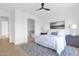 Beautifully designed main bedroom suite with modern decor and access to bathroom at 19550 N Grayhawk Dr # 1039, Scottsdale, AZ 85255