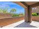 Spacious outdoor patio offering views of the surrounding landscape and clear blue sky at 19550 N Grayhawk Dr # 1039, Scottsdale, AZ 85255