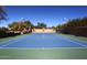 Well-maintained tennis court with ample lighting, perfect for evening matches and outdoor recreation at 19550 N Grayhawk Dr # 1039, Scottsdale, AZ 85255