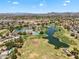 Community aerial view of the golf course and lake at 19920 N 69Th Ave, Glendale, AZ 85308