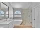 This bathroom features double sinks, a soaking tub, and a glass-enclosed shower at 19920 N 69Th Ave, Glendale, AZ 85308