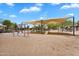 A playground featuring swings, a slide and sunshade at 19920 N 69Th Ave, Glendale, AZ 85308