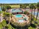 Stunning aerial view of the pool area with a spa, seating, and beautifully landscaped surroundings at 19920 N 69Th Ave, Glendale, AZ 85308