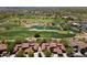 Stunning aerial view of the community with a golf course, lakes, and well-maintained landscaping at 20750 N 87Th St # 1024, Scottsdale, AZ 85255