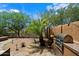 Private backyard featuring desert landscaping, built-in barbecue and stunning desert views at 20750 N 87Th St # 1024, Scottsdale, AZ 85255