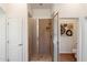 Modern bathroom with a glass-enclosed shower and tile surround at 20750 N 87Th St # 1024, Scottsdale, AZ 85255