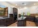 Gourmet kitchen with granite countertops and a center island at 20750 N 87Th St # 1024, Scottsdale, AZ 85255