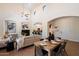 Spacious living room featuring a fireplace and high ceilings, seamlessly connecting to the kitchen at 20750 N 87Th St # 1024, Scottsdale, AZ 85255