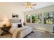 Serene main bedroom with large windows offering great outdoor views and a relaxing setting at 20750 N 87Th St # 1024, Scottsdale, AZ 85255