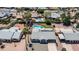 A beautiful home with desert landscaping and a private backyard swimming pool surrounded by lush, mature palm trees at 2139 W Obispo Ave, Mesa, AZ 85202