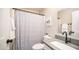 Charming bathroom featuring a shower with stylish curtain, modern vanity, and tasteful decor at 2139 W Obispo Ave, Mesa, AZ 85202