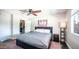 Bedroom featuring a ceiling fan, natural light, closet, and modern accents at 2139 W Obispo Ave, Mesa, AZ 85202