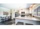 Eat in kitchen features lots of cabinetry and stainless steel appliances, plus open to living room at 2139 W Obispo Ave, Mesa, AZ 85202