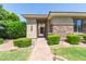 Inviting front entrance with a brick walkway and decorative stone accents at 21912 E Desert Hills Dr, Queen Creek, AZ 85142
