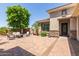 Beautiful front yard featuring an outdoor seating area and desert landscaping at 21912 E Desert Hills Dr, Queen Creek, AZ 85142