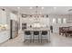 Spacious kitchen features a large island, stainless appliances, and stylish white cabinetry at 21912 E Desert Hills Dr, Queen Creek, AZ 85142