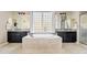 Luxurious bathroom featuring dual vanities, soaking tub, and lots of natural light at 21912 E Desert Hills Dr, Queen Creek, AZ 85142