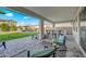 Outdoor patio with pavers, a covered seating area, and a built-in bar at 22870 E Sonoqui Blvd, Queen Creek, AZ 85142