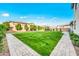 This spacious backyard offers ample space for relaxation and recreation with beautiful landscaping at 22870 E Sonoqui Blvd, Queen Creek, AZ 85142