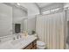 Well-lit bathroom featuring a modern vanity with white countertop, and neutral accents at 22870 E Sonoqui Blvd, Queen Creek, AZ 85142