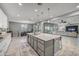 Bright, open kitchen area flows into the dining room and living spaces, perfect for entertaining at 22870 E Sonoqui Blvd, Queen Creek, AZ 85142
