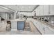 Spacious kitchen with a large island, modern stainless steel appliances, and white cabinets at 22870 E Sonoqui Blvd, Queen Creek, AZ 85142