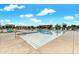 Beautiful community pool with plenty of seating and pergolas perfect for enjoying the sunny days at 22870 E Sonoqui Blvd, Queen Creek, AZ 85142