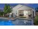 View of the spacious backyard with pool, spa, and outdoor seating area at 2339 E Questa Dr, Phoenix, AZ 85024