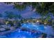 Backyard oasis featuring pool, spa, waterfall feature and comfortable lounge chairs at 2339 E Questa Dr, Phoenix, AZ 85024