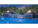 Close up of the tranquil mosaic tiled pool waterfall and fire bowls at 2339 E Questa Dr, Phoenix, AZ 85024