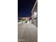 Spacious backyard patio with pergola, outdoor kitchen, and string lights perfect for entertaining at 23630 W Chambers St, Buckeye, AZ 85326