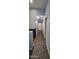 Hallway with carpet and access to several rooms at 23630 W Chambers St, Buckeye, AZ 85326