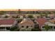 Residential neighborhood with well-maintained homes and solar panels on the roof at 2401 E Antigua Dr, Casa Grande, AZ 85194